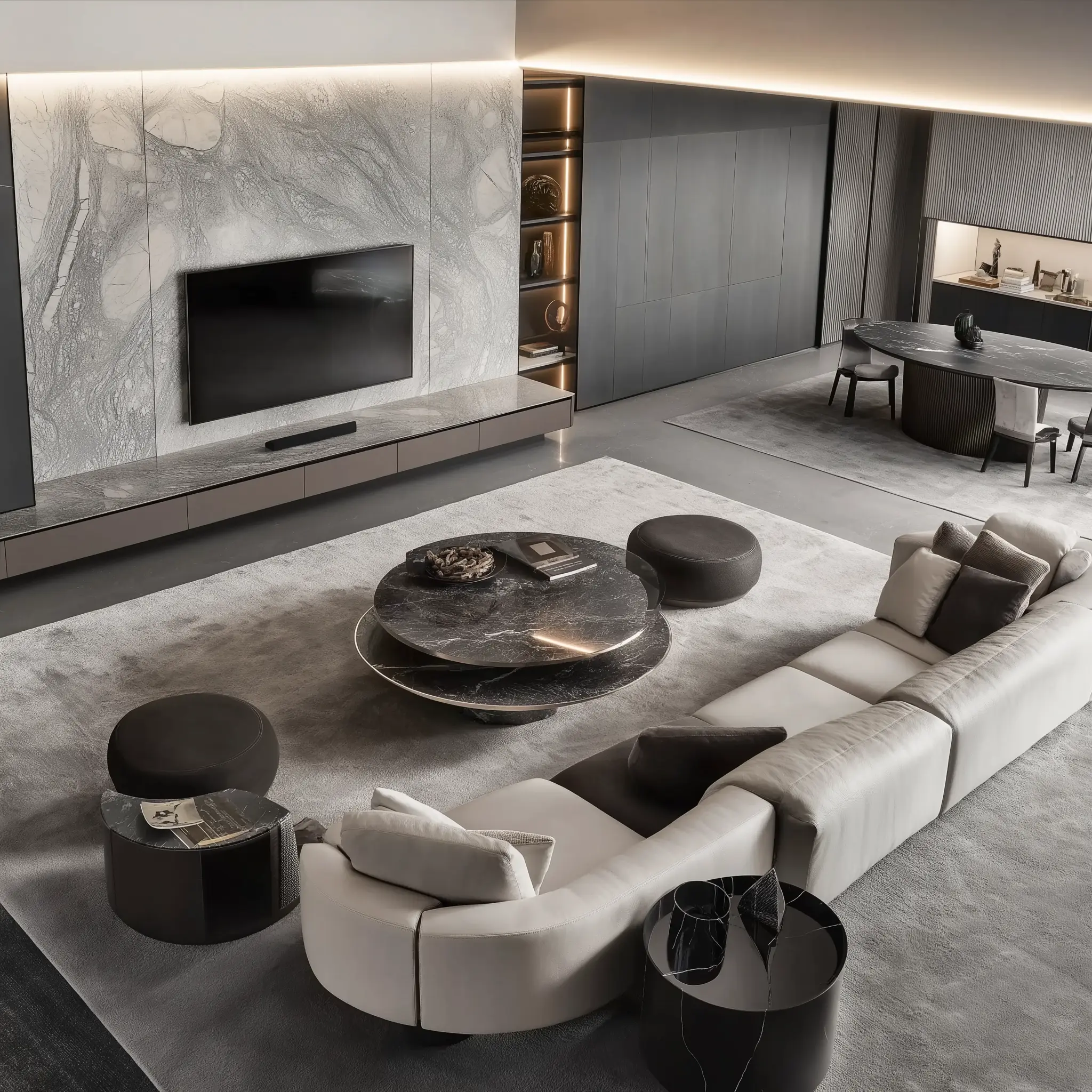 Minimalist Elegance: Modern Living and Dining Room Design A modern living room and dining room with a Minotti sofa, a marble coffee table, a Poliform TV cabinet, and an elegant round dining table.