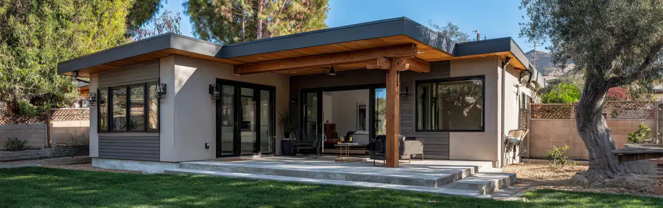 A modern ADU blending seamlessly into a suburban backyard environment, designed by Ladera Ranch ADU builders.
