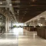 Comparative photorealistic rendering of a tech-style open office and a traditional corporate office for commercial interior design.