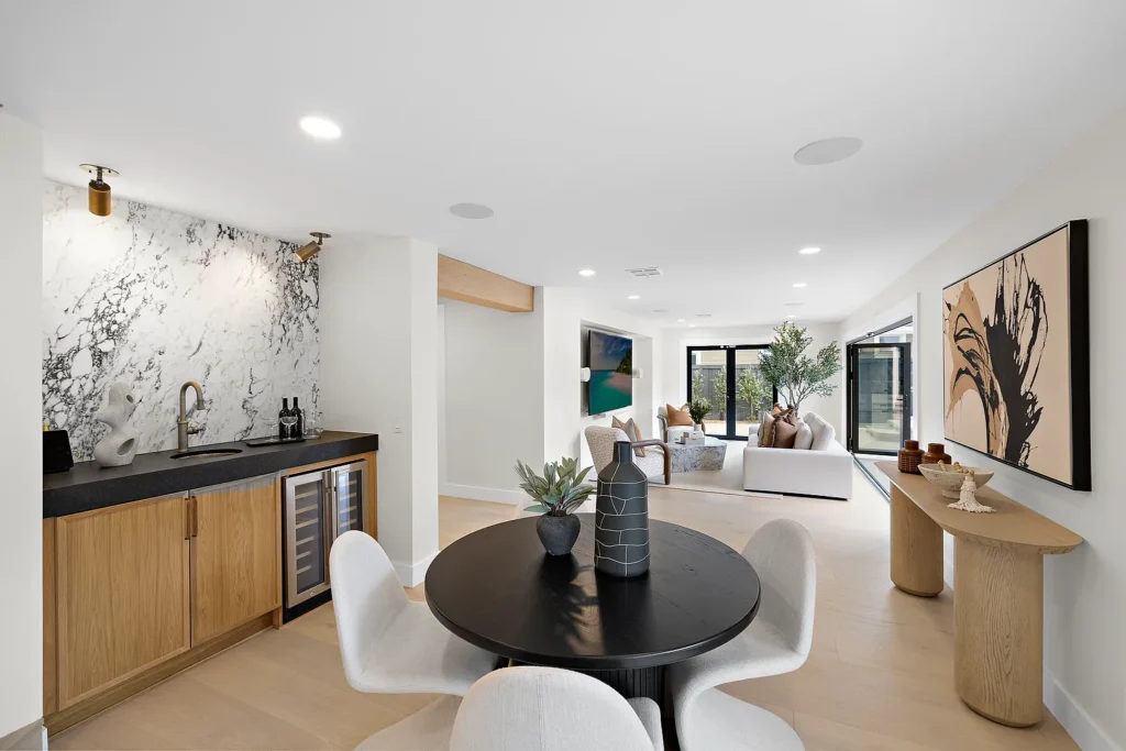 Private ADU living and dining area at 1700 Port Ashley Pl Newport Beach with wet bar and modern furnishings