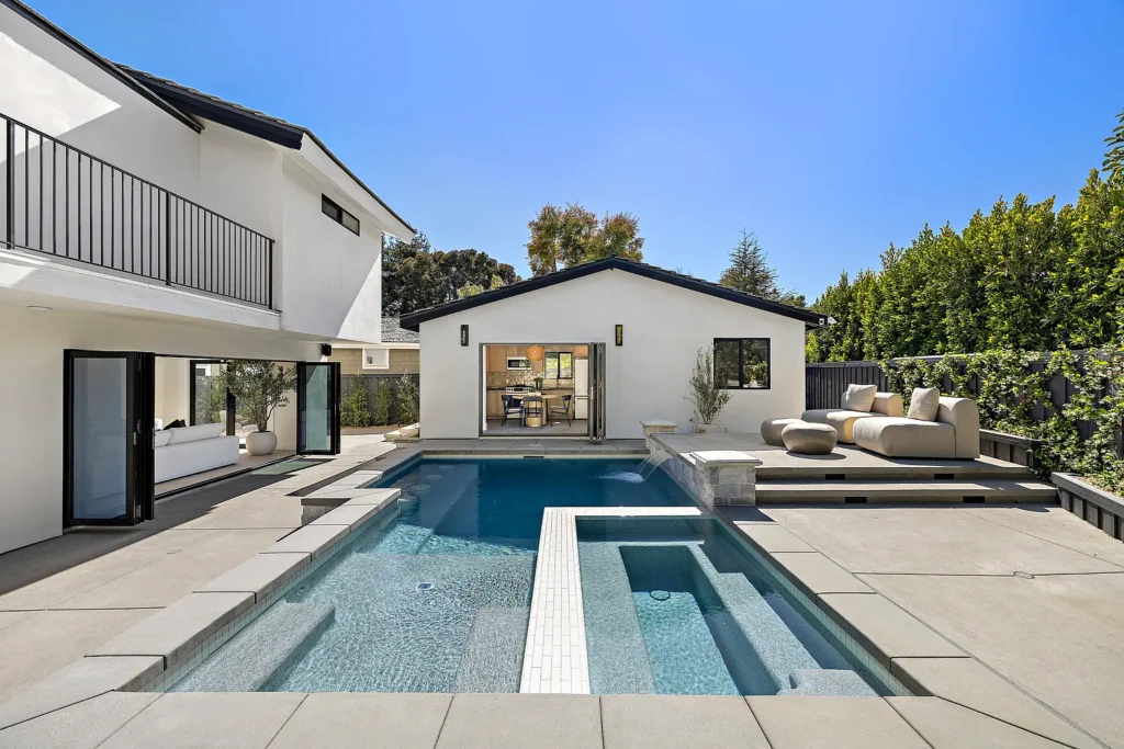 Private swimming pool and backyard at 1700 Port Ashley Pl Newport Beach with modern outdoor living areas
