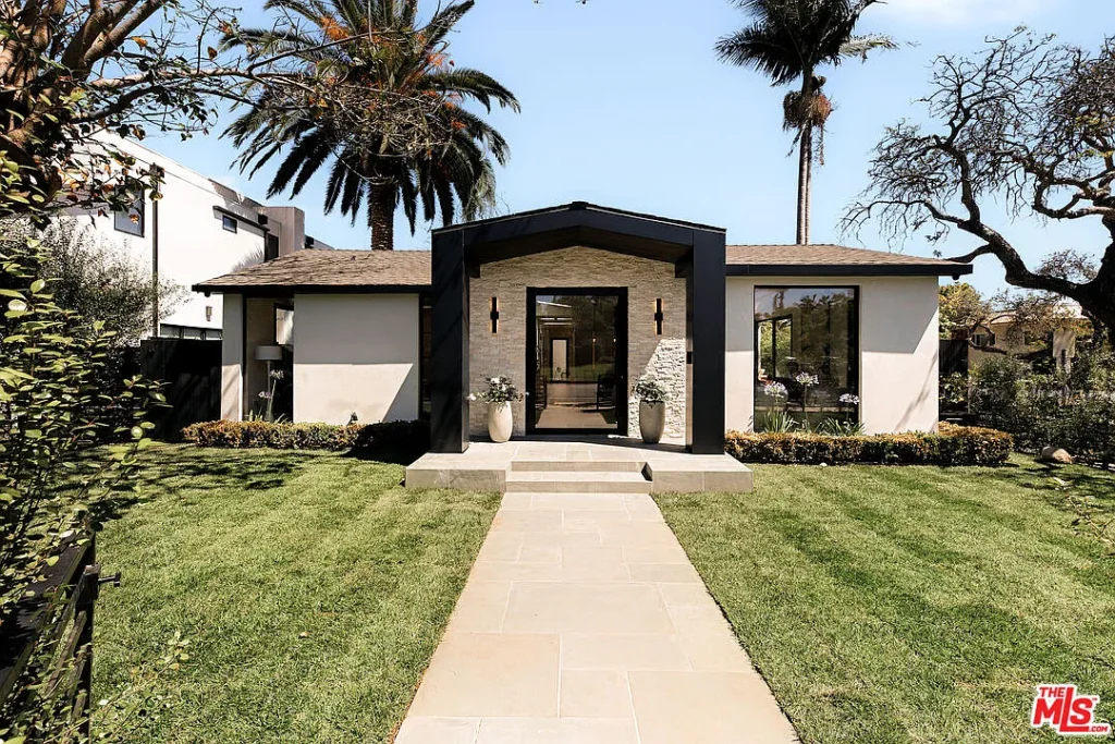 Modern exterior of 2202 California Ave in Santa Monica, California, featuring a landscaped front yard, stone entryway and contemporary architectural design
