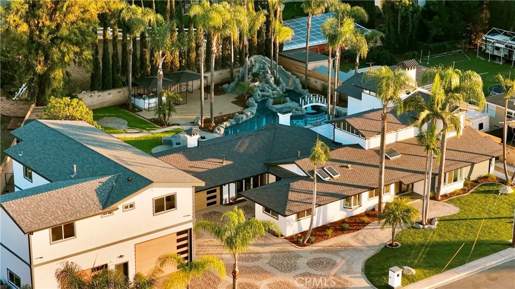 Aerial view of 5782 Ohio St Yorba Linda California luxury home with pool and landscaped backyard